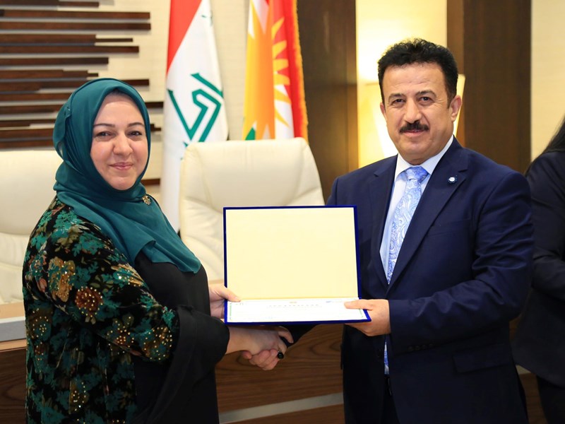 Parliament Speaker Dr. Rewas Faiq presents certificates to MPs and staff